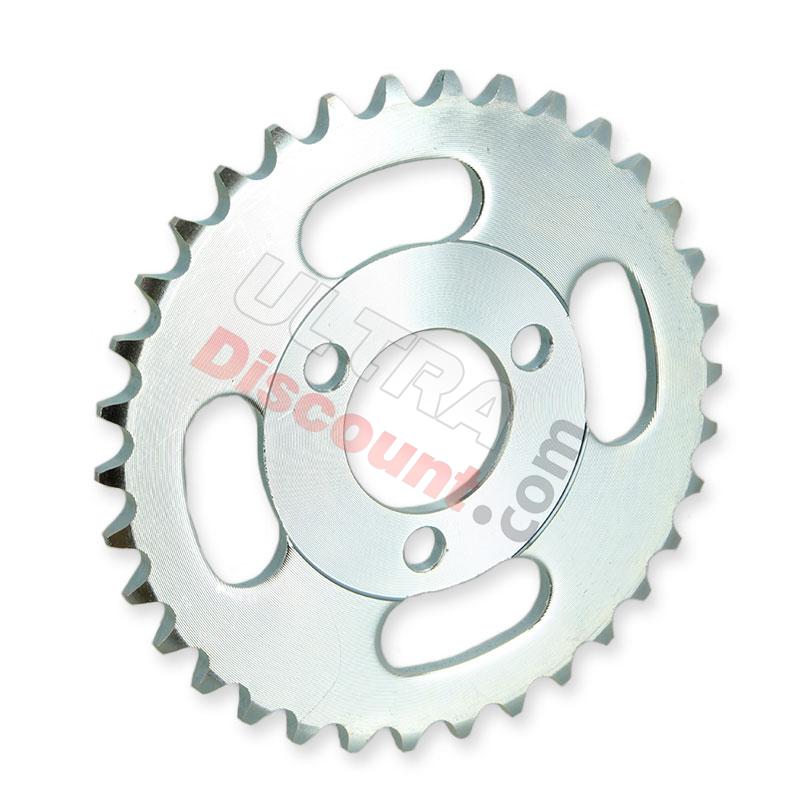 Corona Skymini Skyteam 50cc a 125cc (34 dientes) - zinc blanco, Piezas para Monkey - Gorilla Corona Skymini Skyteam 50cc a 125cc (34 dientes) - zinc blanco, Piezas para Monkey - Gorilla